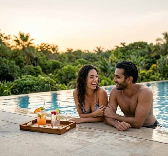 A couple by the pool at midday