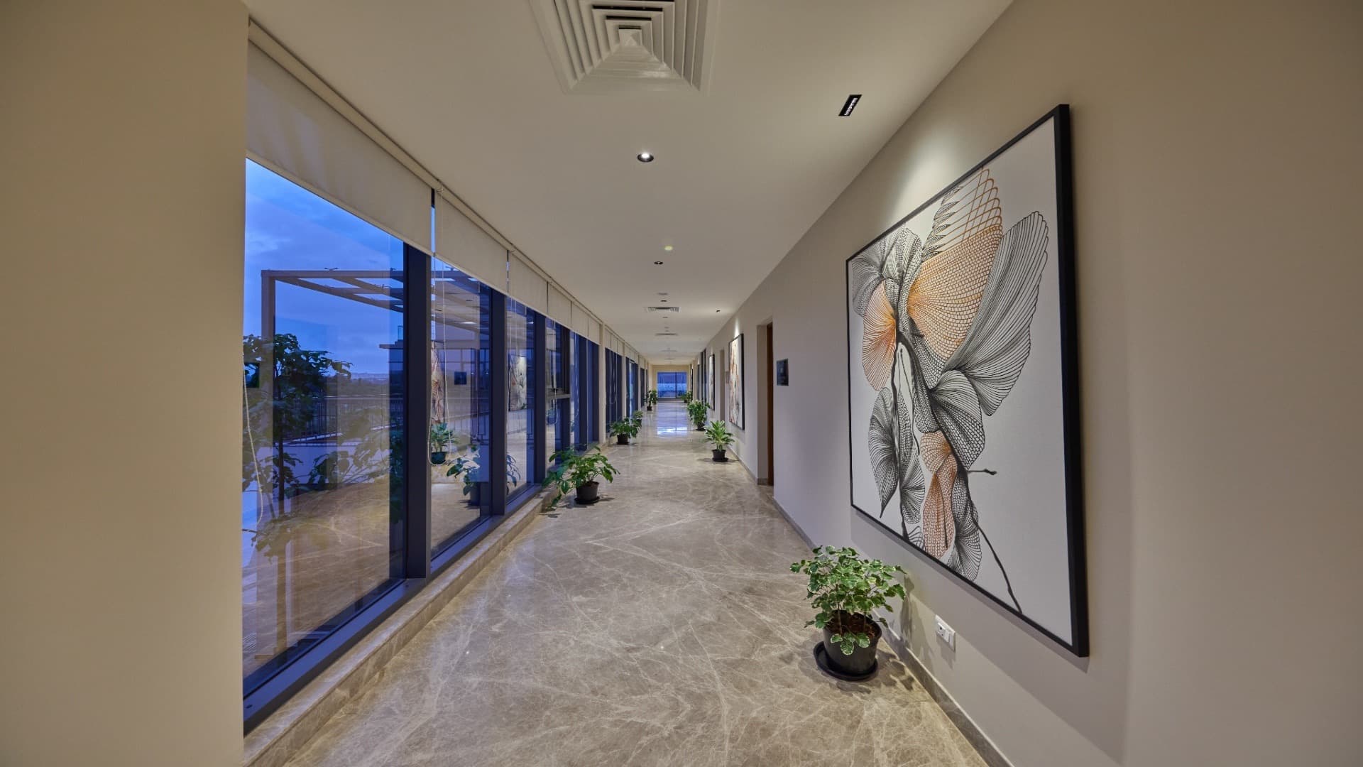 A gallery corridor with artwork at Orchards