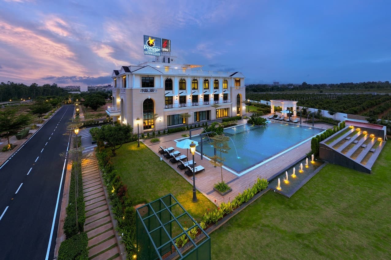 Aerial view of Park Drive's pool and loungers at twilight